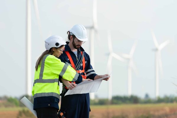 Professional recruiter reviewing renewable energy engineer resumes